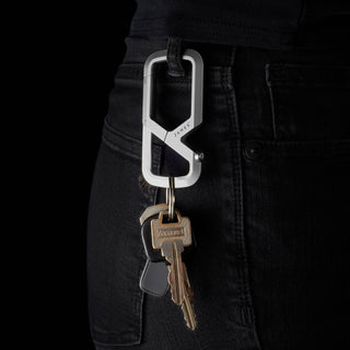 James The Mehlville Carabiner in anodized aluminum securing keys on dark denim jeans pocket loop