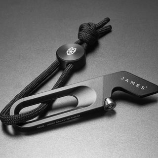 James The Halifax Multitool in black titanium with branded paracord and sleek compact design