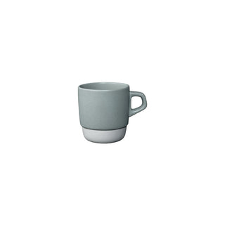 KINTO SLOW COFFEE STYLE Stacking Mug 320ml in muted blue porcelain with a matte finish and unique handle design