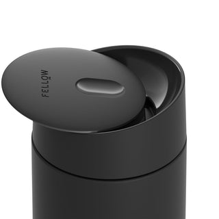 FELLOW Carter Slide Replacement Lid in black BPA-free plastic shown partially open on mug top