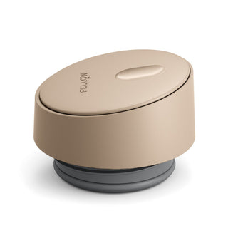 FELLOW Carter Slide Replacement Lid in beige BPA-free plastic shown from side angle with slider detail