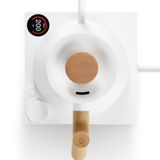 Fellow Stagg EKG Pro Electric Pour Over Kettle (120V) with wooden handle on white base display
