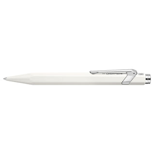 Caran d'Ache 849 Rollerball Pen with white hexagonal aluminum body and polished nickel clip