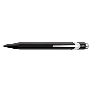 Caran d'Ache 849 Rollerball Pen with black hexagonal aluminum body and nickel-plated clip and button