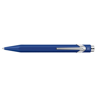 Caran d'Ache 849 Rollerball Pen with deep blue hexagonal aluminum body and chrome clip detailing