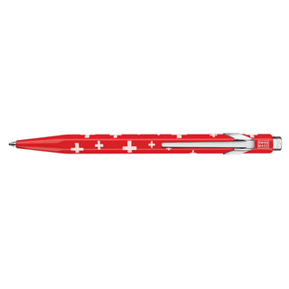 Caran d'Ache 849 Totally Swiss Flag Ballpoint Pen with red hexagonal body and white Swiss crosses pattern
