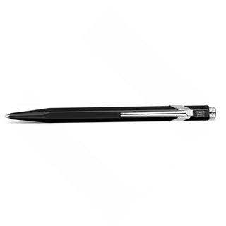 Caran d'Ache 849 Classic Line Ballpoint Pen in sleek black with hexagonal aluminum body and silver clip