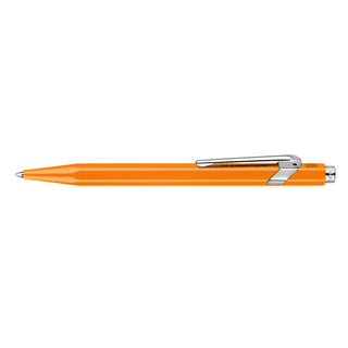 Caran d'Ache 849 Fluo Line Ballpoint Pen with bright orange lacquered hexagonal aluminum body and metal clip