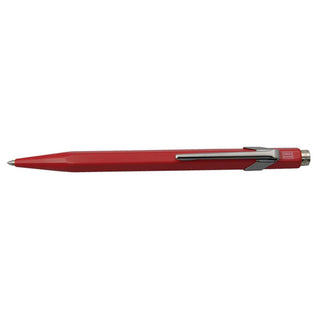 Caran d'Ache 849 Classic Line Ballpoint Pen in red with hexagonal aluminum body and silver clip