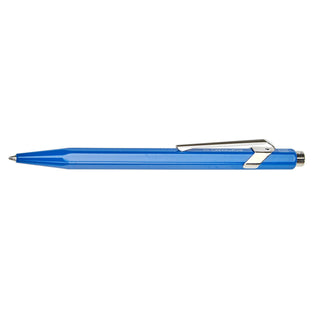 Caran d'Ache 849 Classic Line Ballpoint Pen with hexagonal blue aluminum body and silver clip