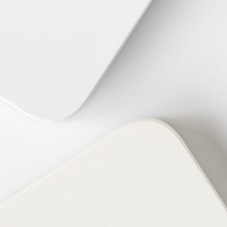 ACAIA Lunar Digital Scale close-up showing smooth white surfaces and rounded edges in minimal style