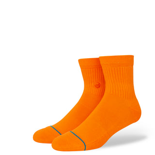 STANCE ICON QUARTER SOCKS in bright orange with ribbed texture and blue toe detail on white background