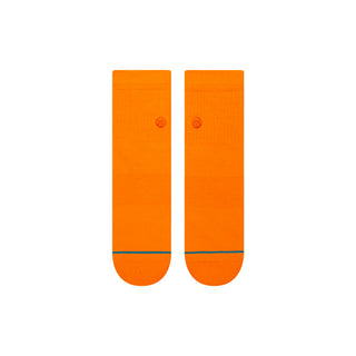 Bright orange STANCE ICON QUARTER SOCKS with subtle logo and reinforced toe stitching shown flat
