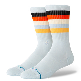 Light blue STANCE MALIBOO CREW SOCKS with black, orange, cream, and yellow stripes and ribbed texture