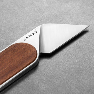James The Abbey Knife with a sharp steel blade and smooth rosewood handle by The James Brand