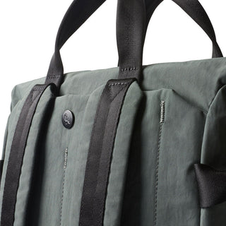 Bellroy Tokyo Totepack Compact in muted green with black straps and durable recycled fabric close-up