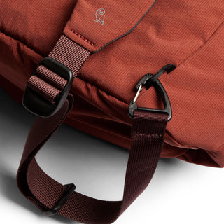 Bellroy Lite Totepack in rust color featuring durable recycled nylon strap and metal hook detail close-up