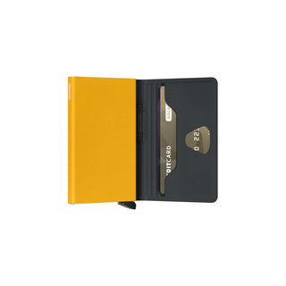 SECRID Secrid Bandwallet TPU non-leather in yellow with black interior showing card slot and embossed card