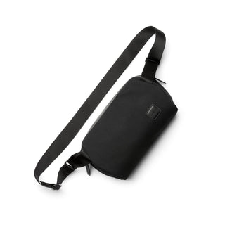 Bellroy Classic Sling 3L in black fabric with adjustable strap and minimalist design on white background