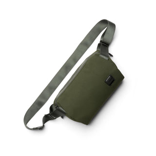 Bellroy Classic Sling 3L in olive green with adjustable fabric strap and smooth zipper closure