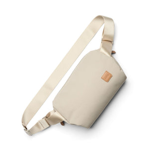 Bellroy Classic Sling 5L in beige with adjustable strap and recycled fabric material accents