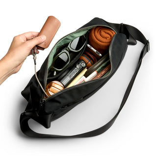 Bellroy Classic Sling 7L in black with organized compartments and eco-friendly recycled fabric interior