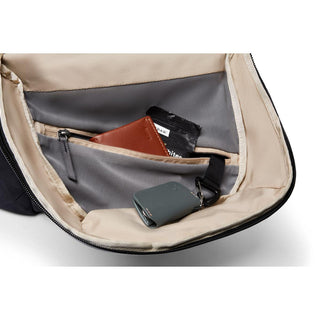Bellroy Via Backpack interior compartments showing organized storage with beige lining and zipper pocket