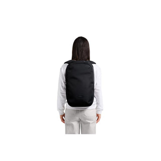 Black Bellroy Via Backpack worn on back, showing sleek, minimalist design and slim profile from rear view