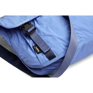 Bellroy Cinch Messenger Bag in blue with adjustable strap and durable recycled nylon fabric close-up