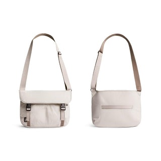 Bellroy Cinch Messenger Bag in soft beige recycled fabric shown from front and back angles
