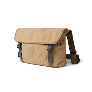 Bellroy Cinch Messenger Bag in tan recycled nylon with adjustable shoulder strap and buckle closures