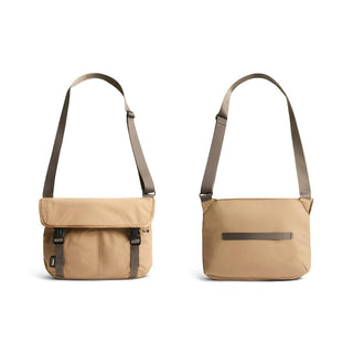 Bellroy Cinch Messenger Bag in tan recycled nylon with front buckles and adjustable shoulder strap