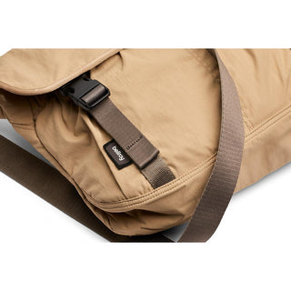 Bellroy Cinch Messenger Bag in tan with adjustable strap and durable recycled fabric close-up