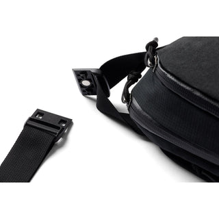 Bellroy Venture Ready Sling 2.5L black fabric bag showing detachable strap and buckle detail