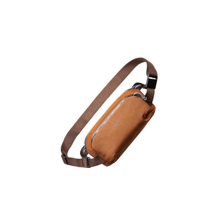 Bellroy Venture Ready Sling 2.5L in brown with adjustable strap and sleek recycled fabric design