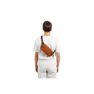 Bellroy Venture Ready Sling 2.5L worn crossbody in brown recycled fabric viewed from back