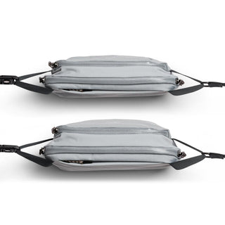 Bellroy Venture Ready Sling 2.5L in light gray showing slim profile with dual zippered compartments and adjustable strap