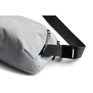 Bellroy Venture Ready Sling 2.5L in light gray with black adjustable strap and durable fabric texture