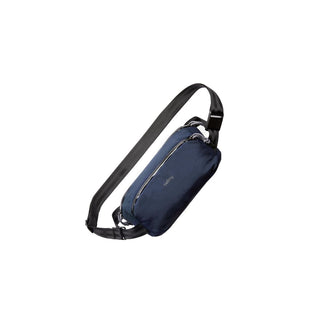 Bellroy Venture Ready Sling 2.5L in navy blue with durable recycled fabric and adjustable black strap