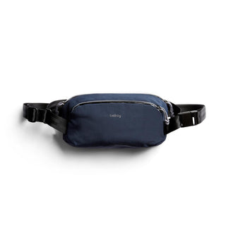 Bellroy Venture Ready Sling 2.5L in navy blue with recycled fabric and black adjustable strap