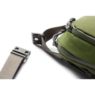 Bellroy Venture Ready Sling 2.5L in olive green showing detachable strap and zipper detail close-up