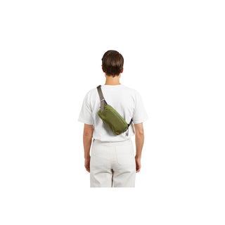 Bellroy Venture Ready Sling 2.5L worn crossbody in olive green recycled nylon fabric