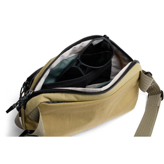 Bellroy Venture Ready Sling 2.5L with open compartment showing organized storage and adjustable strap