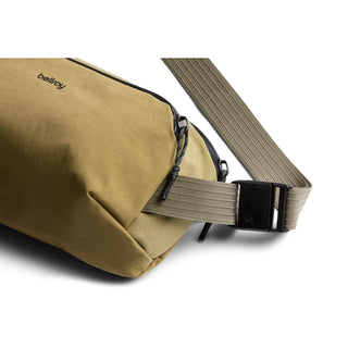 Bellroy Venture Ready Sling 2.5L in tan with durable fabric and adjustable webbing strap close-up