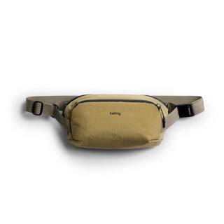 Bellroy Venture Ready Sling 2.5L in olive green fabric with adjustable strap and front zip pocket
