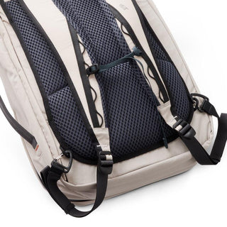 Bellroy Lite Travel Pack 30L showing breathable padded mesh back and adjustable straps in light beige color