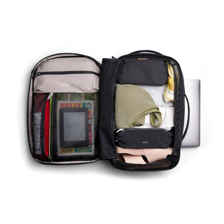 Bellroy Lite Travel Pack 30L open, showing organized interior with clothing, tech, and packing pouches