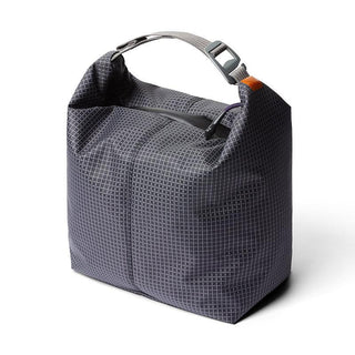 Bellroy Lite Cooler Caddy 10L in dark grid-patterned fabric with adjustable strap and zipper closure