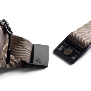 Bellroy Laneway Belt Bag tan strap with magnetic buckle and embossed owl logo close-up view