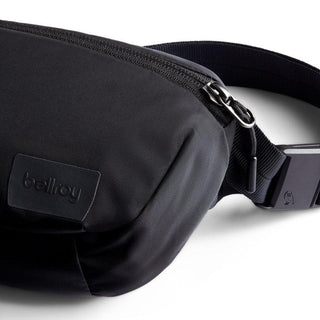Bellroy Laneway Belt Bag in black recycled fabric with zipper and adjustable strap details